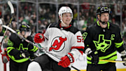 Mar 14, 2024; Dallas, Texas, USA; New Jersey Devils left wing Erik Haula (56) celebrates after he scores a goal as Dallas Stars left wing Jamie Benn (14) looks on during the first period at the American Airlines Center. Mandatory Credit: Jerome Miron-Imagn Images