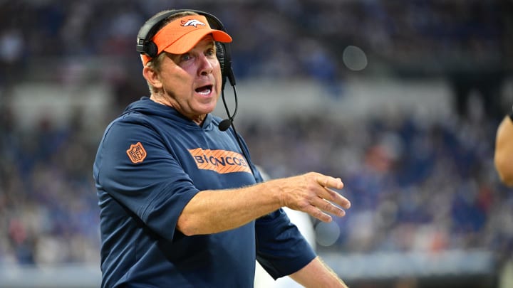 Aug 11, 2024; Indianapolis, Indiana, USA; Denver Broncos Head Coach Sean Payton shares a word with a referee during the second half against the Indianapolis Colts  at Lucas Oil Stadium. Mandatory Credit: Marc Lebryk-USA TODAY Sports