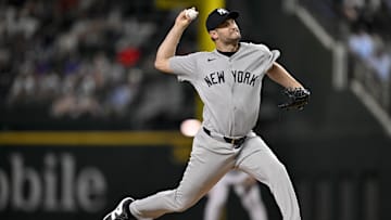 Aug 4, 2025; Arlington, Texas, USA; New York Yankees relief pitcher Jake Bird (59) pitches against the Texas Rangers during the tenth inning at Globe Life Field. Mandatory Credit: Jerome Miron-Imagn Images