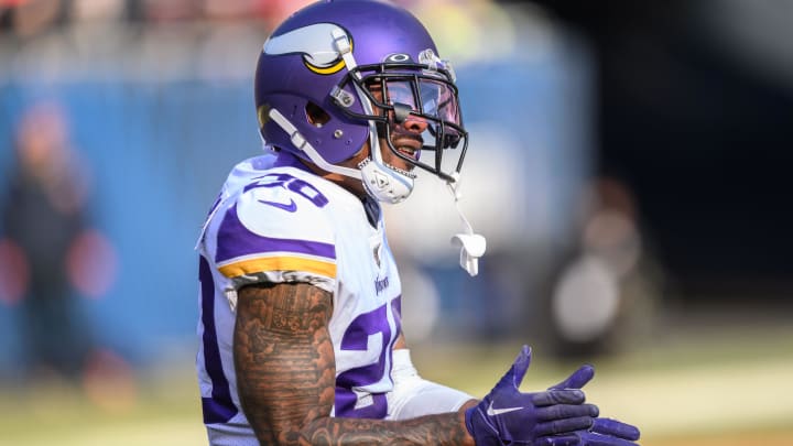 Jan 8, 2023; Chicago, Illinois, USA; Minnesota Vikings cornerback Duke Shelley (20) celebrates a defensive pass break up during the third quarter against the Chicago Bears at Soldier Field.