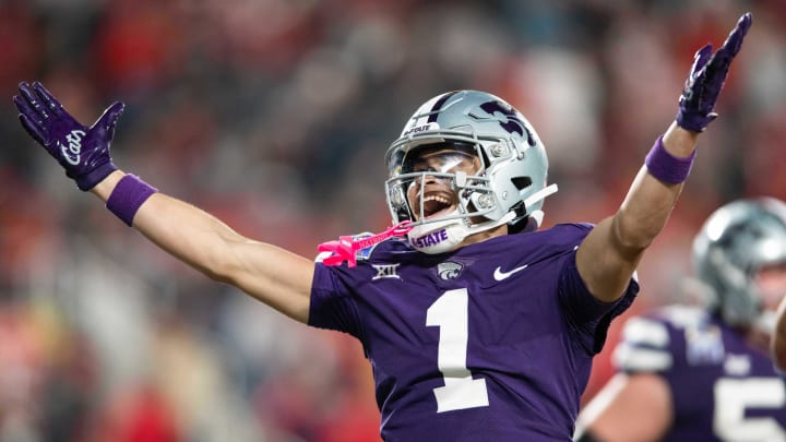 Dec 28, 2023; Orlando, FL, USA; Kansas State wide receiver Jayce Brown (1) celebrates a touchdown against NC State in the fourth quarter at Camping World Stadium. Mandatory Credit: Jeremy Reper-USA TODAY Sports