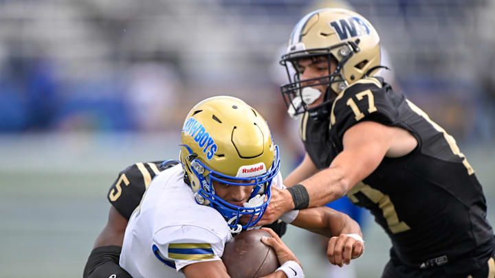 West Boca Raton's defense swarmed Osceola's offense in Saturday's Florida Class 6A state title game. West Boca Raton's defense swarmed Osceola's offense in Saturday's Florida Class 6A state title game.