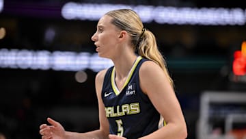 Aug 1, 2025; Dallas, Texas, USA; Dallas Wings guard Paige Bueckers (5) in action during the game between the Dallas Wings and the Indiana Fever at the American Airlines Center. Mandatory Credit: Jerome Miron-Imagn Images