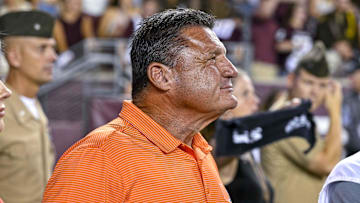 Sep 17, 2022; College Station, Texas, USA; Former LSU head coach Ed Orgeron watches the game between the Texas A&M Aggies and the Miami Hurricanes during the second half at Kyle Field. Mandatory Credit: Jerome Miron-Imagn Images