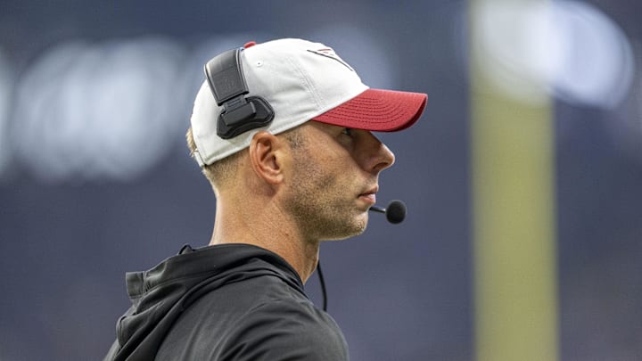 Aug 17, 2024; Indianapolis, Indiana, USA; Arizona Cardinals head coach Jonathan Gannon stands on the side lines during the first quarter against the Indianapolis Colts at Lucas Oil Stadium. Mandatory Credit: Marc Lebryk-Imagn Images