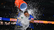 Sep 11, 2025; Seattle, Washington, USA; Seattle Mariners shortstop J.P. Crawford (3) dunks the water jug on pinch hitter Harry Ford (5) after the Mariners defeated the Los Angeles Angels at T-Mobile Park. Mandatory Credit: Steven Bisig-Imagn Images