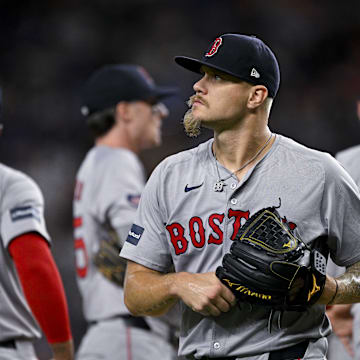 Aug 3, 2024; Arlington, Texas, USA;  Boston Red Sox starting pitcher Tanner Houck (89) leaves the game against the Texas Rangers during the sixth inning at Globe Life Field. Mandatory Credit: Jerome Miron-Imagn Images