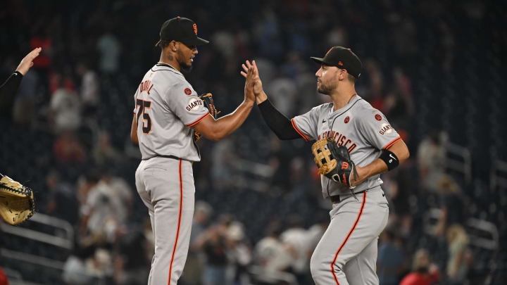 Aug 5, 2024; Washington, District of Columbia, USA; San Francisco Giants left fielder Michael Conforto (8) and relief pitcher Camilo Doval (75) celebrate after defeating the Washington Nationals at Nationals Park.