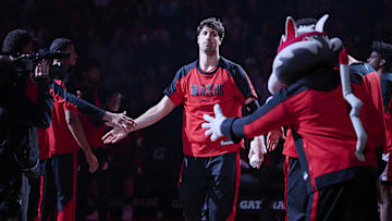 Mar 19, 2025; Portland, Oregon, USA; Portland Trail Blazers forward Deni Avdija (8) high fives teammates during introductions before a game against the Memphis Grizzlies at Moda Center. Mandatory Credit: Troy Wayrynen-Imagn Images