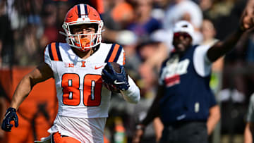 Oct 4, 2025; West Lafayette, Indiana, USA; Illinois Fighting Illini wide receiver Hank Beatty (80) runs the ball down field during the second quarter against the Purdue Boilermakers at Ross-Ade Stadium. Mandatory Credit: Marc Lebryk-Imagn Images
