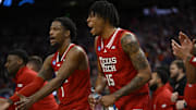 Mar 29, 2025; San Francisco, CA, USA; Texas Tech Red Raiders guard Kevin Overton (1) and forward JT Toppin (15) react during the second half against the Florida Gators during the West Regional final of the 2025 NCAA tournament at Chase Center. Mandatory Credit: Eakin Howard-Imagn Images