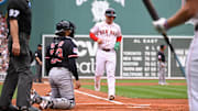 Sep 1, 2025; Boston, Massachusetts, USA; Boston Red Sox third baseman Alex Bregman (2) scores on an RBI by second baseman Romy Gonzalez (23) (not pictured)  during the first inning against the Cleveland Guardians at Fenway Park. Mandatory Credit: Eric Canha-Imagn Images