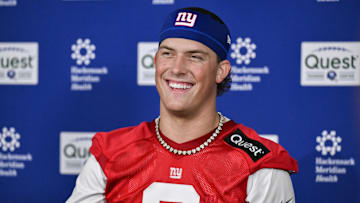 May 9, 2025; East Rutherford, NJ, USA; New York Giants quarterback Jaxson Dart (6) speaks to members of the press after rookie minicamp at Quest Diagnostics Training Center.  