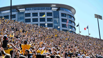 Sep 2, 2023; Iowa City, Iowa, USA; Fans at Kinnick Stadium during the game between the Iowa Hawkeyes and the Utah State Aggies do the Iowa Wave with the University of Iowa Stead Family Children's Hospital. Mandatory Credit: Jeffrey Becker-USA TODAY Sports