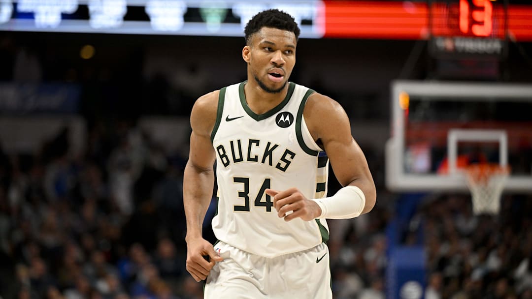 Milwaukee Bucks forward Giannis Antetokounmpo (34) runs back up the court during the second half against the Dallas Mavericks at the American Airlines Center. 