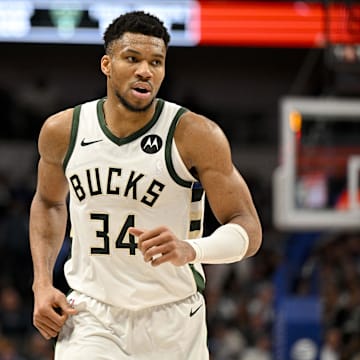 Milwaukee Bucks forward Giannis Antetokounmpo (34) runs back up the court during the second half against the Dallas Mavericks at the American Airlines Center. 