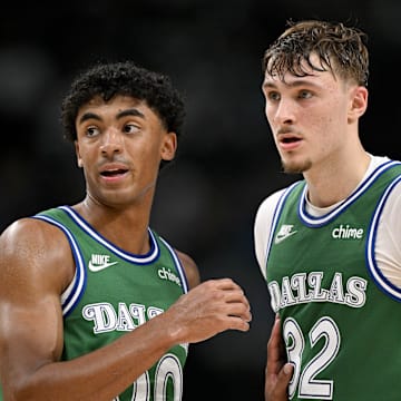 Oct 26, 2025; Dallas, Texas, USA; Dallas Mavericks guard Max Christie (00) talks with forward Cooper Flagg (32) during the second half against the Toronto Raptors at the American Airlines Center. Mandatory Credit: Jerome Miron-Imagn Images