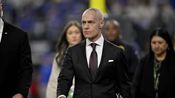 Dec 6, 2025; Arlington, TX, USA; Big 12 commissioner Brett Yormark walks on the field during the first half between the Texas Tech Red Raiders and the BYU Cougars at AT&T Stadium. Mandatory Credit: Jerome Miron-Imagn Images