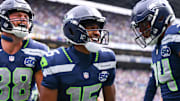 Sep 21, 2025; Seattle, Washington, USA; Seattle Seahawks wide receiver Tory Horton (15) celebrates after scoring a 95 yard punt return for a touchdown against the New Orleans Saints during the first quarter at Lumen Field. Mandatory Credit: Steven Bisig-Imagn Images