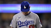 Apr 20, 2025; Arlington, Texas, USA; Los Angeles Dodgers relief pitcher Evan Phillips (59) comes off the field during the game between the Texas Rangers and the Los Angeles Dodgers at Globe Life Field. Mandatory Credit: Jerome Miron-Imagn Images