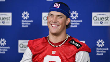 May 9, 2025; East Rutherford, NJ, USA; New York Giants quarterback Jaxson Dart (6) speaks to members of the press after rookie minicamp at Quest Diagnostics Training Center. Mandatory Credit: John Jones-Imagn Images