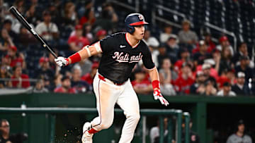 May 6, 2025; Washington, District of Columbia, USA;  Washington Nationals first baseman Nathaniel Lowe (33) singles during the ninth inning against the Cleveland Guardians at Nationals Park