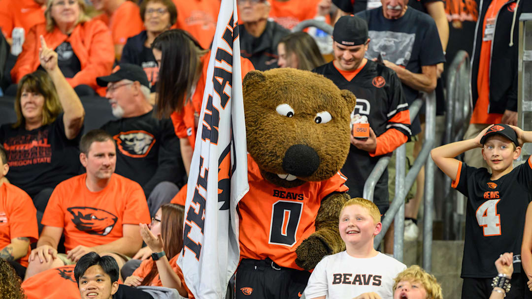 Sep 26, 2025; Corvallis, Oregon, USA; Oregon State Beavers mascot Benny Beaver interacts with fans during the second quarter against the Houston Cougars at Reser Stadium. Mandatory Credit: Craig Strobeck-Imagn Images