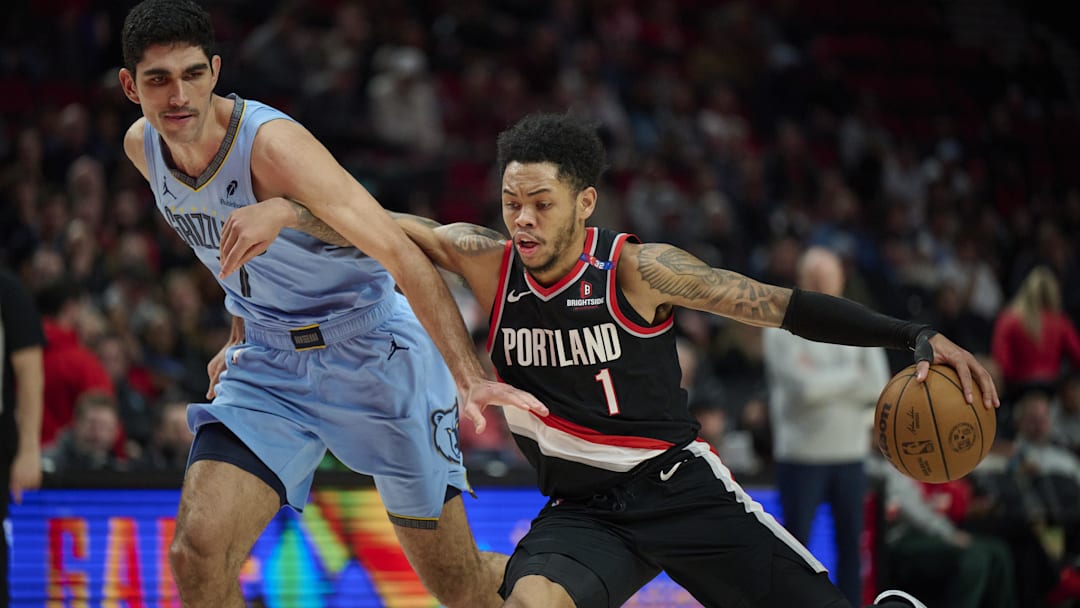 Mar 19, 2025; Portland, Oregon, USA; Portland Trail Blazers guard Anfernee Simons (1) drives to the basket during the second half against Memphis Grizzlies forward Santi Aldama (7) at Moda Center. Mandatory Credit: Troy Wayrynen-Imagn Images