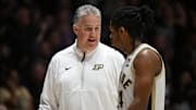 Purdue Boilermakers head coach Matt Painter shares a moment with guard Gicarri Harris 