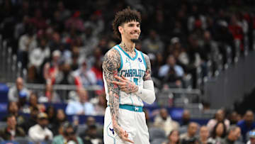 Oct 26, 2025; Washington, District of Columbia, USA; Charlotte Hornets guard LaMelo Ball (1) reacts after making a three point basket against the Washington Wizards during the third quarter at Capital One Arena. Mandatory Credit: Rafael Suanes-Imagn Images