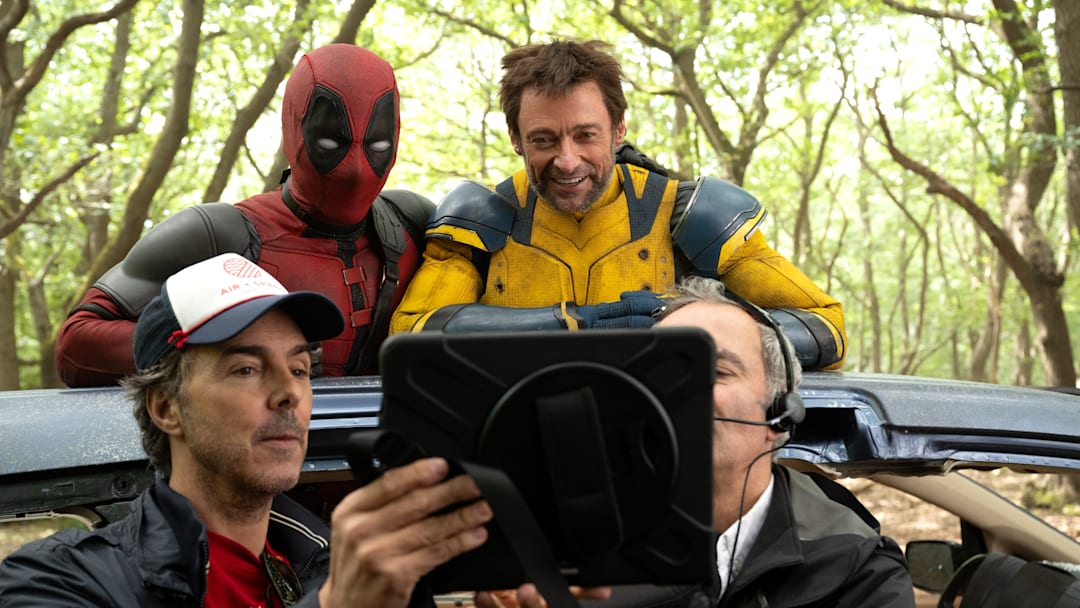 (L-R): Director Shawn Levy, Ryan Reynolds, and Hugh Jackman on the set of Marvel Studios' DEADPOOL & WOLVERINE. Photo by Jay Maidment. © 2024 20th Century Studios / © and ™ 2024 MARVEL.