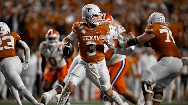 Dec 21, 2024; Austin, Texas, USA; Texas Longhorns quarterback Quinn Ewers (3) rolls out to pass against the Clemson Tigers during the second half of the CFP National Playoff first round game at Darrell K Royal-Texas Memorial Stadium. Mandatory Credit: Jerome Miron-Imagn Images Dec 21, 2024; Austin, Texas, USA; Texas Longhorns quarterback Quinn Ewers (3) rolls out to pass against the Clemson Tigers during the second half of the CFP National Playoff first round game at Darrell K Royal-Texas Memorial Stadium. Mandatory Credit: Jerome Miron-Imagn Images
