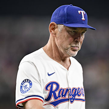 Jun 19, 2025; Arlington, Texas, USA; Texas Rangers manager Bruce Bochy (15) walks back to the dugout during the seventh inning against the Kansas City Royals at Globe Life Field. 