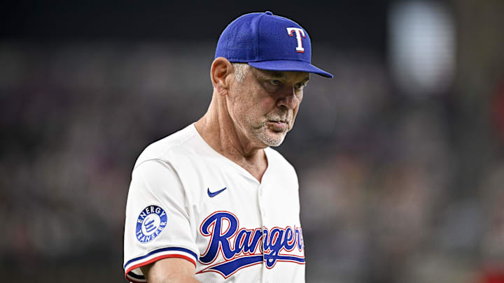 Jun 19, 2025; Arlington, Texas, USA; Texas Rangers manager Bruce Bochy (15) walks back to the dugout during the seventh inning against the Kansas City Royals at Globe Life Field. 