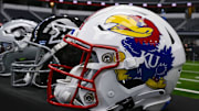 Jul 12, 2023; Arlington, TX, USA; A view of the Kansa Jayhawks helmet and logo during Big 12 football media day at AT&T Stadium. Mandatory Credit: Jerome Miron-Imagn Images