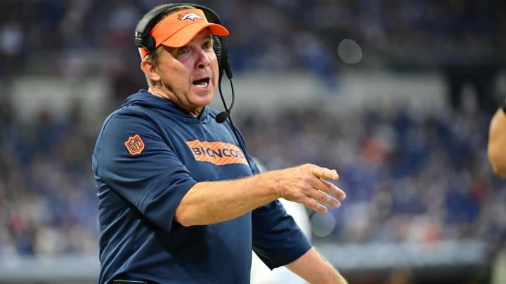 Aug 11, 2024; Indianapolis, Indiana, USA; Denver Broncos Head Coach Sean Payton shares a word with a referee during the second half against the Indianapolis Colts  at Lucas Oil Stadium. Mandatory Credit: Marc Lebryk-USA TODAY Sports