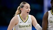 Sep 11, 2025; Arlington, Texas, USA; Dallas Wings guard Paige Bueckers (5) celebrates during the second half against the Phoenix Mercury at College Park Center. Mandatory Credit: Jerome Miron-Imagn Images