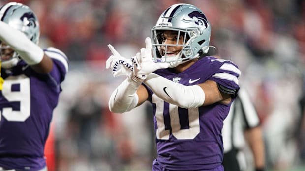Kansas State cornerback Jacob Parrish (10) celebrates an interception against NC State.