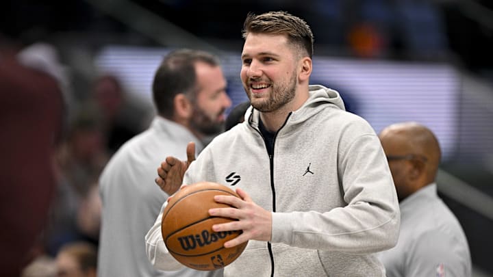 Jan 22, 2025; Dallas, Texas, USA; Dallas Mavericks guard Luka Doncic (77) looks on during a stoppage in play during the first half of the game between the Dallas Mavericks and the Minnesota Timberwolves at the American Airlines Center. Mandatory Credit: Jerome Miron-Imagn Images