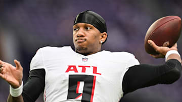 Dec 8, 2024; Minneapolis, Minnesota, USA; Atlanta Falcons quarterback Michael Penix Jr. (9) warms up before the game against the Minnesota Vikings at U.S. Bank Stadium. Mandatory Credit: Jeffrey Becker-Imagn Images