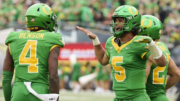oregon ducks dakorien moore malik benson wide receiver big ten nil transfer portal recruiting dante moore dan lanning 