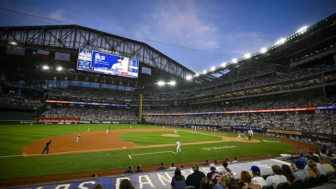 Apr 5, 2024; Arlington, Texas, USA; A view of the open roof and the sky and the field and the fans during the game between the Texas Rangers and the Houston Astros at Globe Life Field.