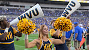 Sep 14, 2024; Pittsburgh, Pennsylvania, USA; West Virginia Mountaineers cheerleaders perform during the fourth quarter against the Pittsburgh Panthers at Acrisure Stadium. Mandatory Credit: Barry Reeger-Image Images