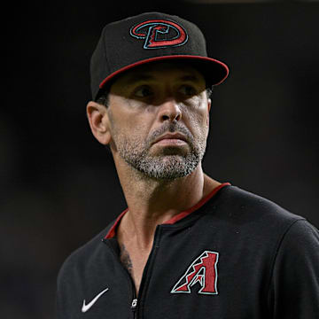 Aug 11, 2025; Arlington, Texas, USA; Arizona Diamondbacks pitching coach Brian Kaplan (77) during the game between the Texas Rangers and the Arizona Diamondbacks at Globe Life Field. Mandatory Credit: Jerome Miron-Imagn Images