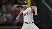 Aug 4, 2025; Arlington, Texas, USA; Texas Rangers relief pitcher Jon Gray (22) in action during the game between the Texas Rangers and the New York Yankees at Globe Life Field.
