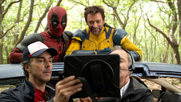 (L-R): Director Shawn Levy, Ryan Reynolds, and Hugh Jackman on the set of Marvel Studios' DEADPOOL & WOLVERINE. Photo by Jay Maidment. © 2024 20th Century Studios / © and ™ 2024 MARVEL.