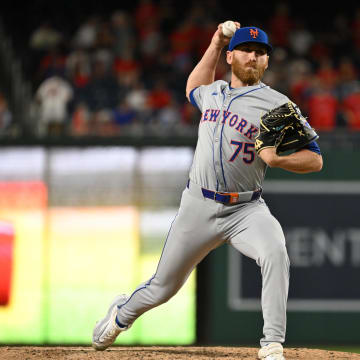 Jul 1, 2024; Washington, District of Columbia, USA; New York Mets relief pitcher Reed Garrett (75) prepares the throw a pitch against the Washington Nationals during the tenth inning at Nationals Park. Mandatory Credit: Rafael Suanes-USA TODAY Sports