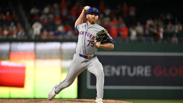 Jul 1, 2024; Washington, District of Columbia, USA; New York Mets relief pitcher Reed Garrett (75) prepares the throw a pitch against the Washington Nationals during the tenth inning at Nationals Park. Mandatory Credit: Rafael Suanes-USA TODAY Sports