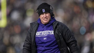 Nov 19, 2022; West Lafayette, Indiana, USA;  Northwestern Wildcats head coach Pat Fitzgerald walks the sidelines during the second quarter against the Purdue Boilermakers at Ross-Ade Stadium. Mandatory Credit: Marc Lebryk-Imagn Images