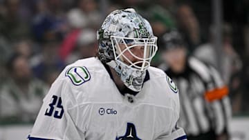 Apr 8, 2025; Dallas, Texas, USA; Vancouver Canucks goaltender Thatcher Demko (35) faces the Dallas Stars attack during the second period at the American Airlines Center. Mandatory Credit: Jerome Miron-Imagn Images